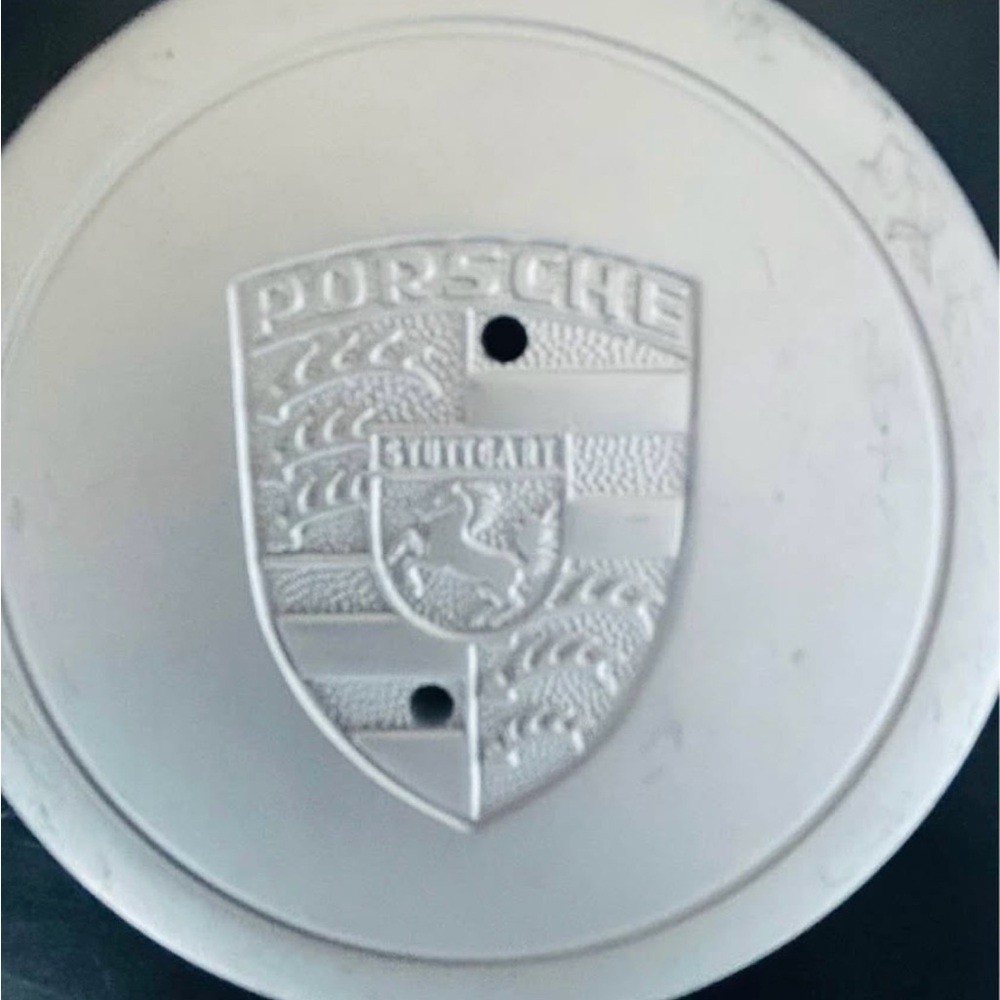Porsche Design Silver color Wheel Caps Brand New
0010